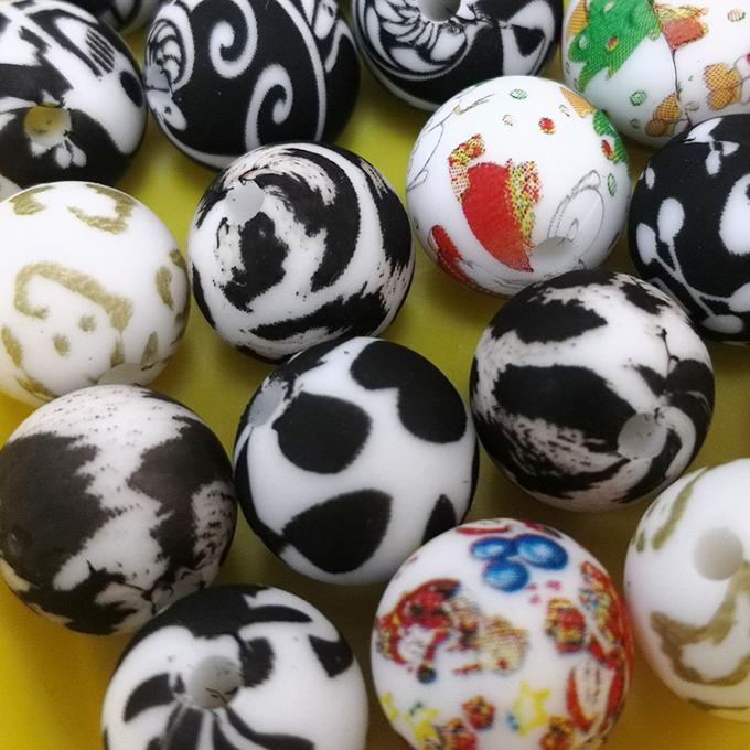 En gros le silicone imprimé fait sur commande de 12mm perle les perles en vrac caoutchouteuses de Teether de silicone d'impression de léopard pour le jouet de dentition de bébé de DIY