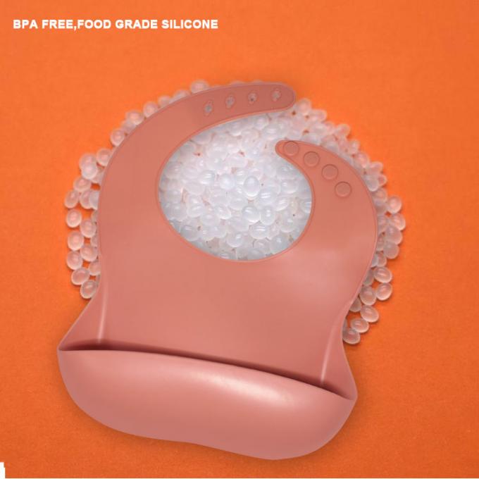 Les bavoirs imperméables en gros de bébé de silicone avec s'enroulent pour des enfants en bas âge de nourrissons