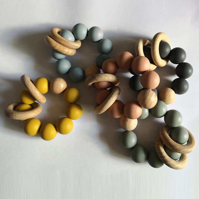 Teether fait sur commande de bébé de silicone de jouets de perles de silicone avec le bracelet 2 en bois