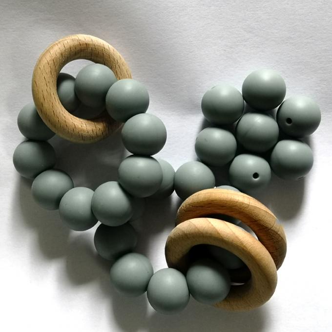La dentition perle le nouveau doux de couleur autour du silicone formé pour le silicone de catégorie comestible du bébé 100%