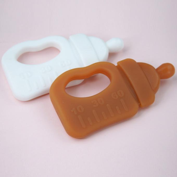 Les nouvelles dents faites sur commande de bouteille de conception mâchent le jouet libre de Teether de bébé du silicone BPA de bâton avec la boîte