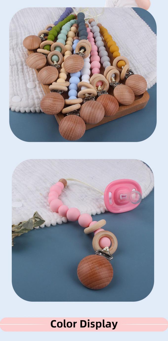 Prévention factice de chaîne de tétine de bébé de bébé de perle en bois qui respecte l'environnement en gros de silicone avec l'anneau en bois